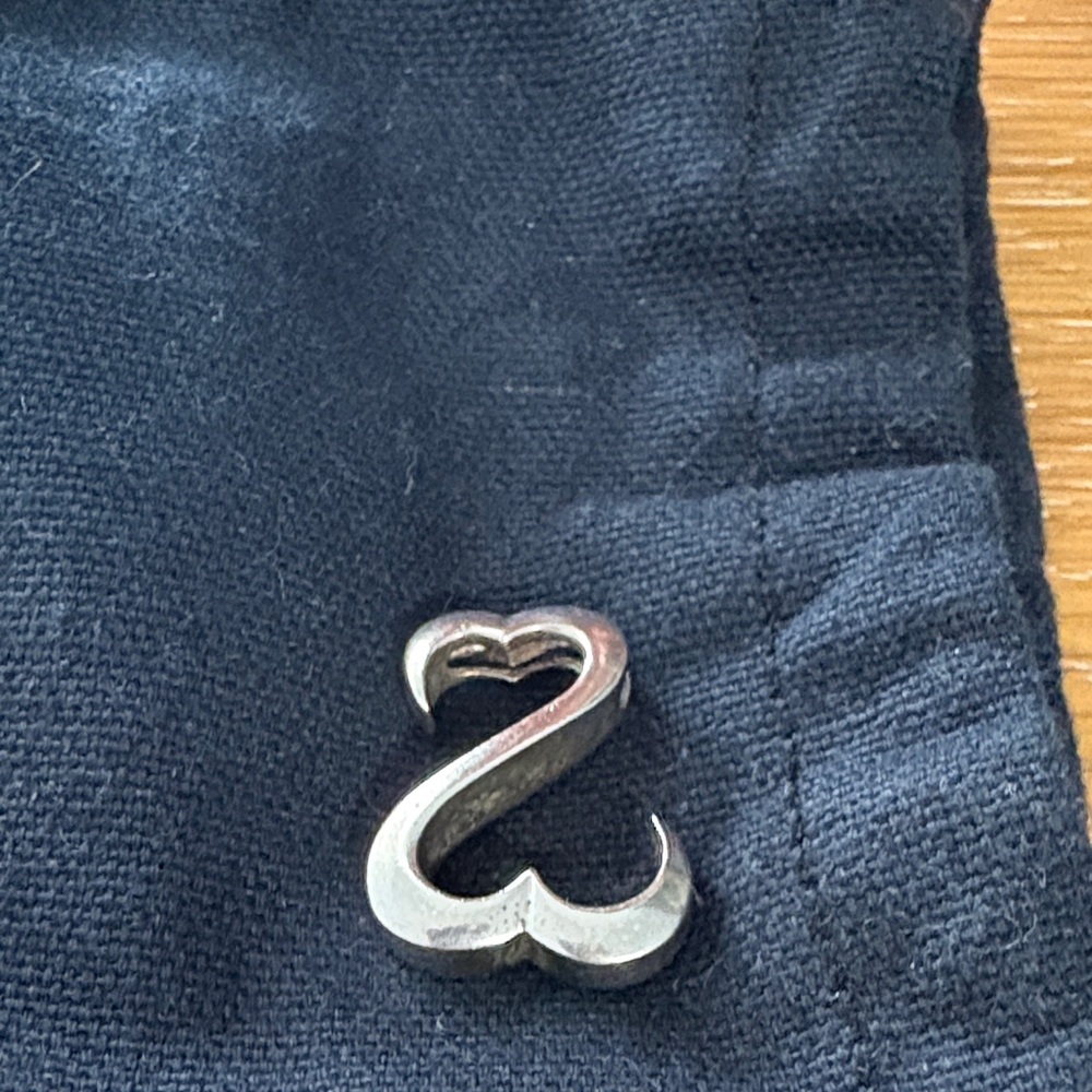 Jane Seymour open heart pendant
